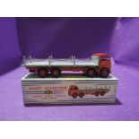 A Dinky Supertoys diecast, Foden Flat Truck with Chains having red cab and chassis, grey bed with