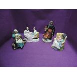 Four Royal Doulton figurines, Nanny HN2221, Sweat Dreams HN2380, Heart to Heart HN2276 and Good King