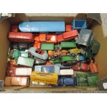 A box of 1950's and later Dinky, Corgi, Timpo and similar playworn diecast vehicles