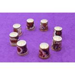 A collection of eight Royal Crown Derby Thimbles including Derby Old Japan and Derby Garden