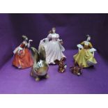 Two Royal Doulton figurines, Stephanie HN2807 & Flower Of Love HN3970, A Royal Worceter figurine,