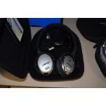 A pair of Bose Acoustic Noise Cancelling headphones , Quiet Comfort 20