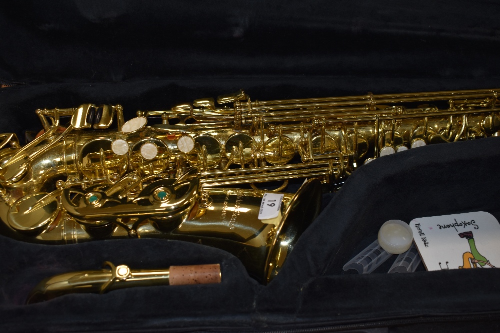 An Arnold and Sons alto saxophone, model ASA-110Y