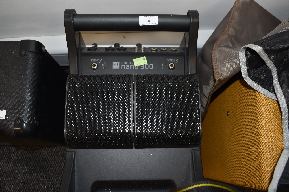 A HK Lucas Nano 300 combo amp system, no speaker stands
