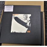 A deluxe boxed set of Led Zep ' 1 ' with booklet - mint and unplayed with heavy booklet and vinyl