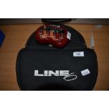 A Line 6 pocket pod guitar effects unit