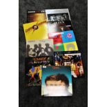 A lot of nine vinyl albums by Queen