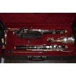 A Buffet bass or alto clarinet, in fitted case