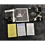 A book of Eric Clapton interest with inserts and facsimile gig posters , flyers and more - a