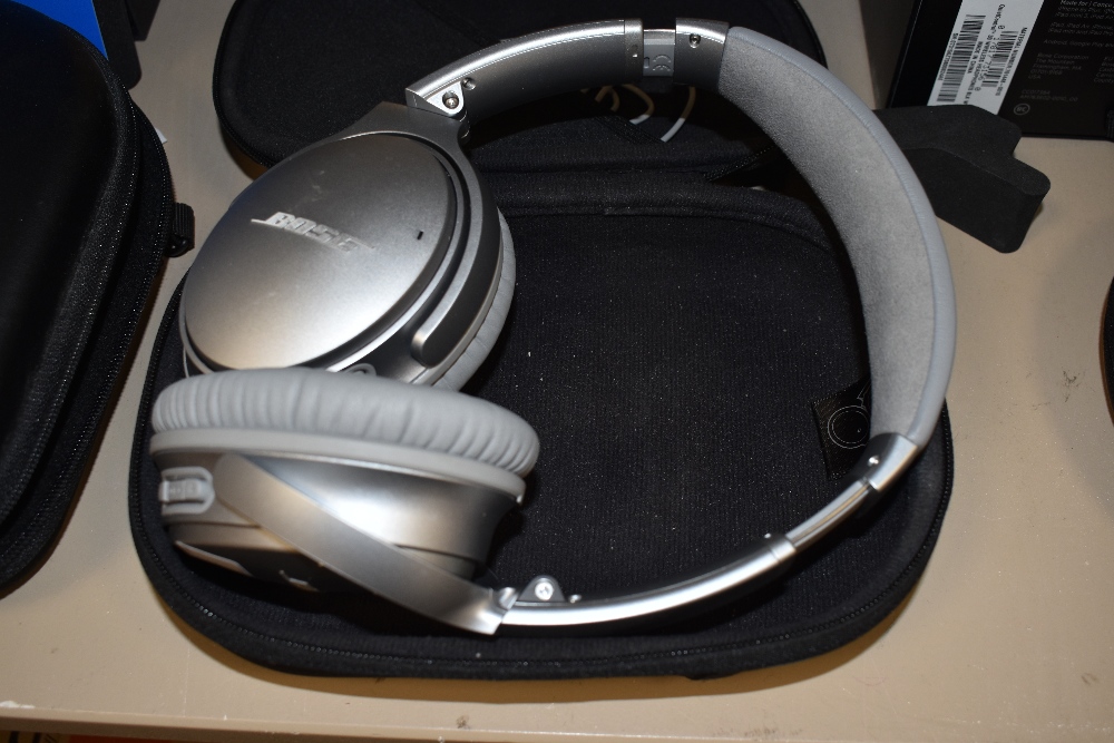 A pair of Bose Noise Cancelling headphones with bluetooth