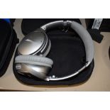 A pair of Bose Noise Cancelling headphones with bluetooth