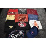 A selection of Hardrock cafe and similar music related T shirts