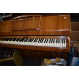 A mid 20th century walnut cased piano by Eavestaff, 'PianetteMini Piano' six and a half octave