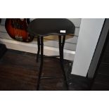 A padded guitar stool/stand