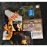 A lot of five albums by Styx