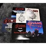 A lot of ten vinyl albums by Saxon - including the iron on patch ! Heavy Metal interest