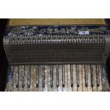 A vintage Pietro piano accordion in case