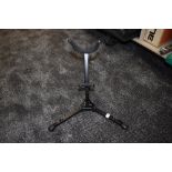 A Hercules instrument stand possibly for saxophone or similar