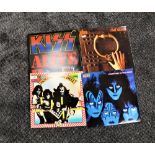 A lot of four albums by Kiss