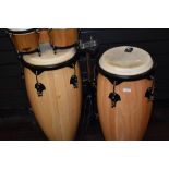 A pair of Toca wood congas, and similar CP bongos and stand