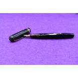 A Conway Stewart 55 fountain pen, leverfill in black with two narrow and one broad band to cap.