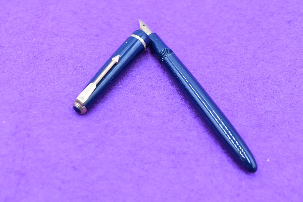 A Parker Slimfold fountain pen in blue, single slim decorative band to cap