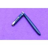 A Parker Slimfold fountain pen in blue, single slim decorative band to cap