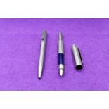 A Parker 25 Flighter fountain pen and ballpoint pen in stainless steel