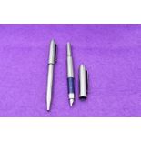A Parker 25 Flighter fountain pen and ballpoint pen in stainless steel