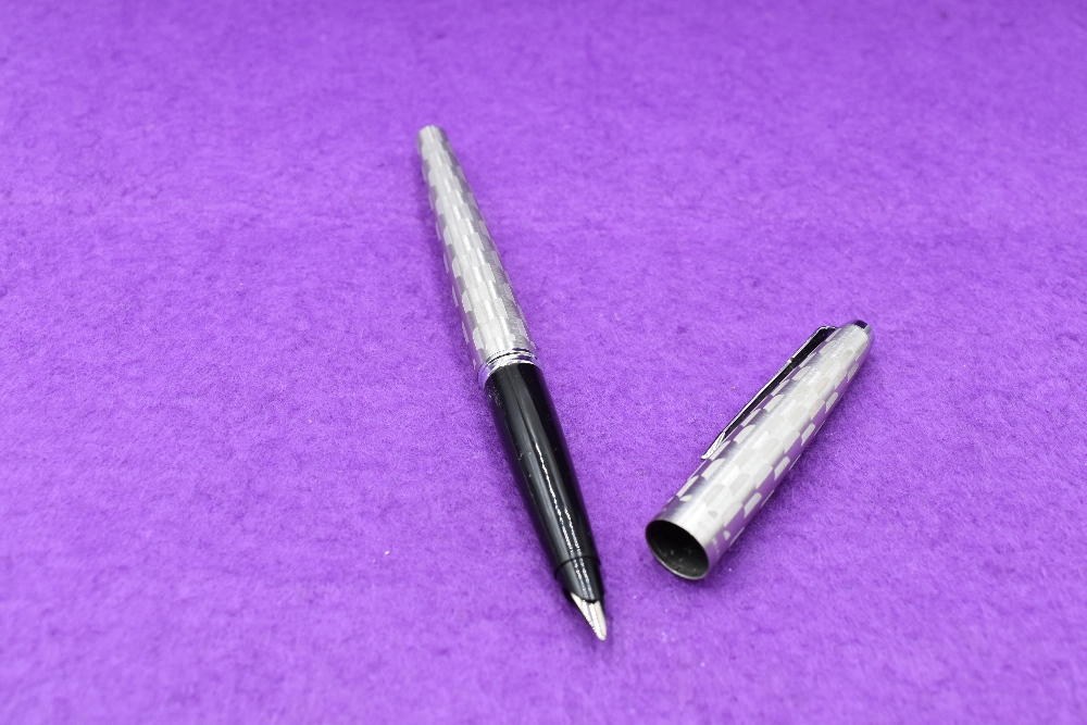 A Parker 45 Harlequin Grey Shield pattern fountain pen