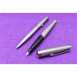 A Parker 45 Harlequin circlet pattern fountain pen and ballpoint set
