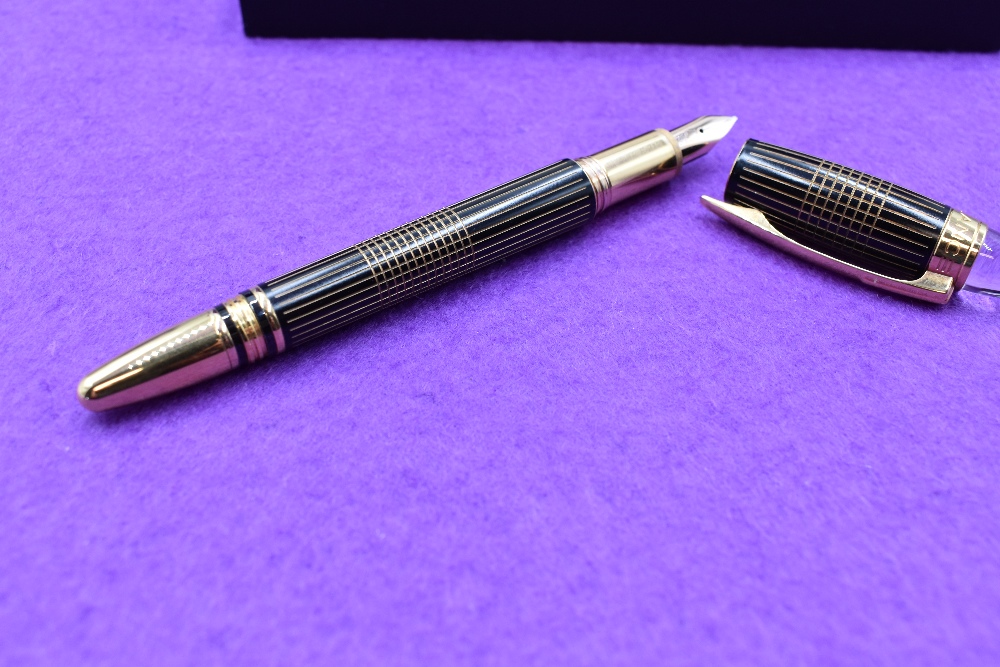 A Montblanc Starwalker fountain pen, with gold trim, in original presentation box. This pen is - Image 2 of 2