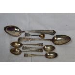 A small selection of HM silver spoons including salt spoon, four commemorative teaspoons regarding