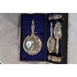 A cased Edwardian silver five piece dressing table set of art nouveau style having moulded orchid