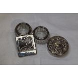 Two cut glass salts having HM silver collars, a white metal circular trinket box stamped sterling