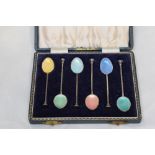A cased set of silver coffee spoons having pastel coloured enamelled bowls, Birmingham 1961, Henry