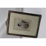 A silver photograph frame of plain rectangular form having moulded ribbon detail to top and velvet