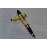 A Conway Stewart Dinky style white metal fountain pen stamped sterling having pale yellow