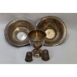 A small selection of silver including two Egyptian silver tea bowls, two HM silver thimbles and an