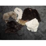 A collection of vintage furs, including fox fur capelet, trims and stole, and an unusual white coney