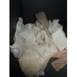 An assortment of vintage lace and crochet work perfect for projects or crafts