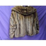 A vintage 1950s short caramel coloured mink jacket, fully lined and in wonderful condition.