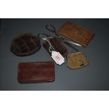 A collection of five vintage and antique purses, including crocodile and leather,and a pair of