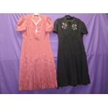 Two vintage dresses, one in pomegranate crepe having been a wedding dress in 1941, the other in