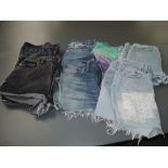 Six pairs of vintage Levi denim high waisted shorts, and one pair 'LEE', some 501 and 502.varied