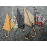 Five vintage umbrellas. All in good condition bar one which has some damage, may be of interest