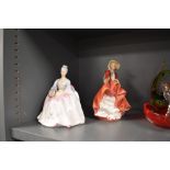 Two ceramic figures by Royal Doulton including Charlotte and Top of The Hill