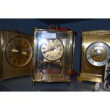 A selection of brass bodied mantle clocks including Avia and Kundo
