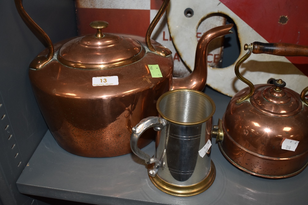 A large sized copper stove kettle with brass fitments and similar early Ediswan electric