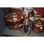 A large sized copper stove kettle with brass fitments and similar early Ediswan electric